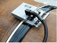 A CMOS scanner being used on a pipeline girth weld. Photo courtesy of American Welding Society