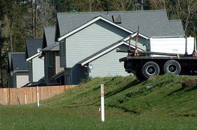 Fence encroaching on the transmission pipeline right-of-way obstructs the pipeline operator’s ability to inspect and maintain the pipeline and could impede emergency access.<br>
Heavy vehicle encroachment (truck shown) could damage the pipeline. Any such encroachment should be coordinated with the pipeline operator.
